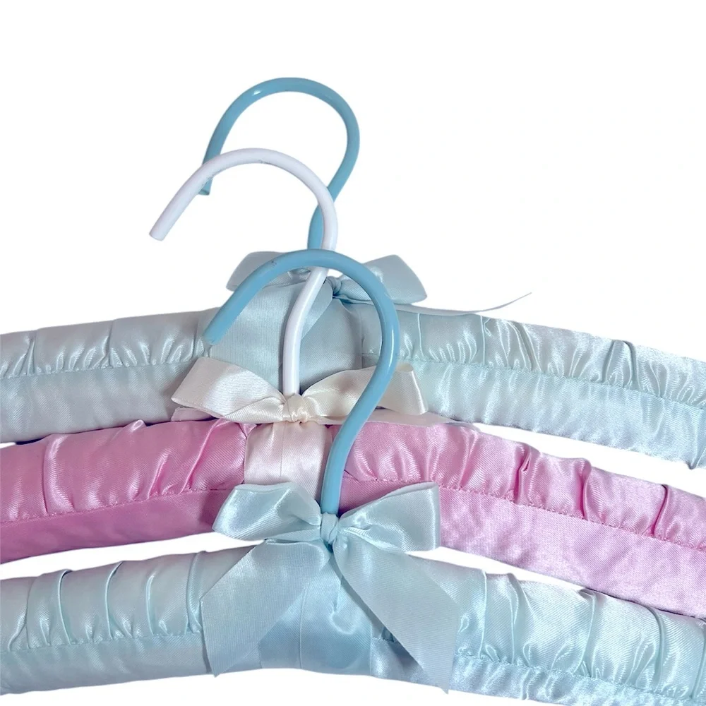 Three Luxurious Padded Satin Hangers-2 Soft Blue and 1 Pink Hanger.
